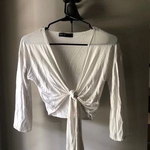 Very light tie front crop! Will launder and iron before shipping.